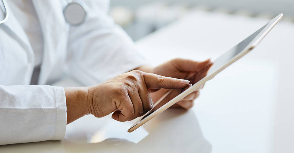 Doctor using mobile app