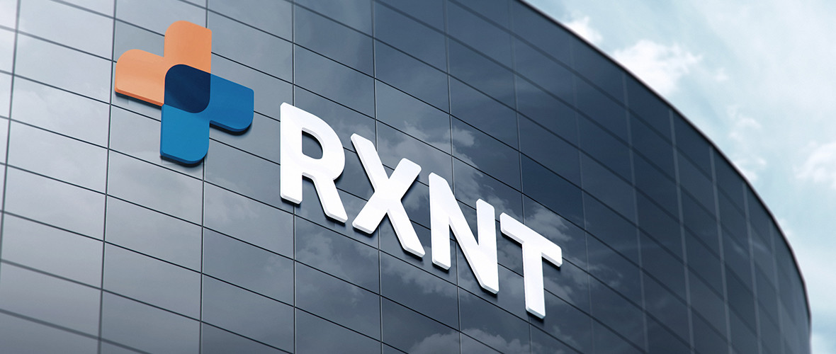 RXNT Logo and name displayed on a building outside