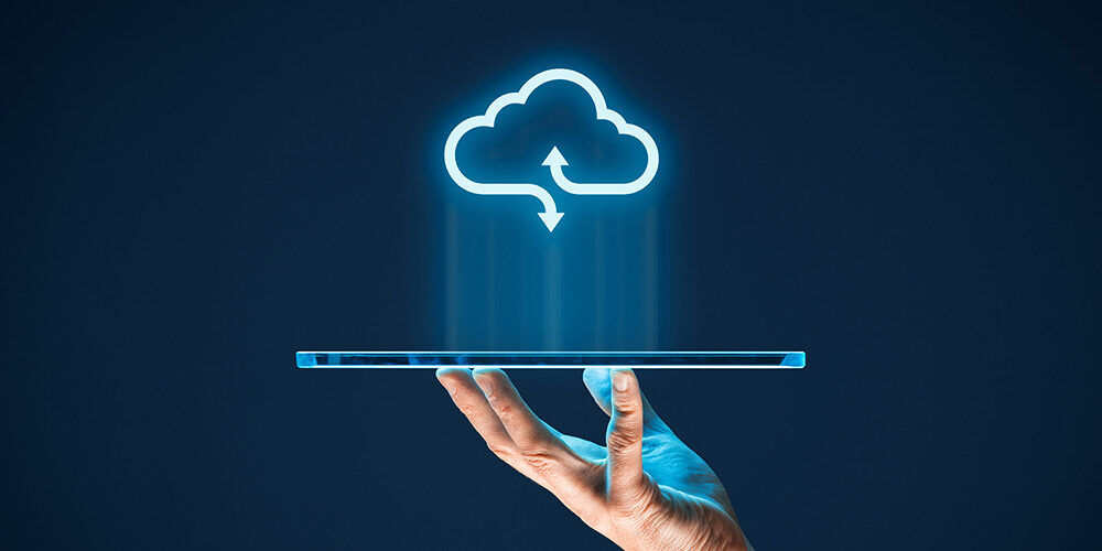 A graphic of a tablet and cloud logo