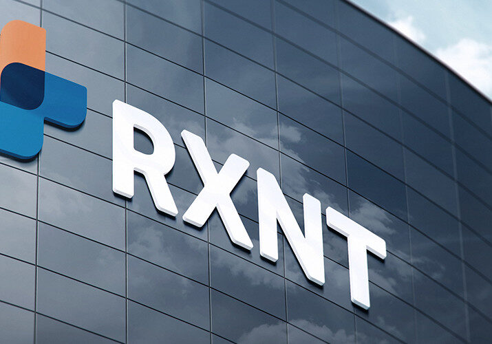 RXNT Logo and name displayed on a building outside