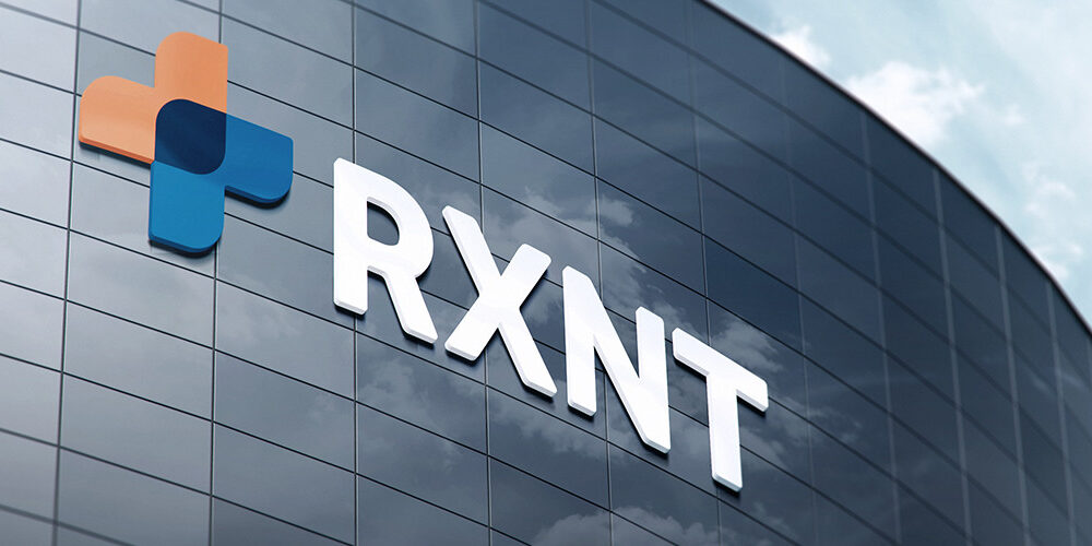 RXNT Logo and name displayed on a building outside