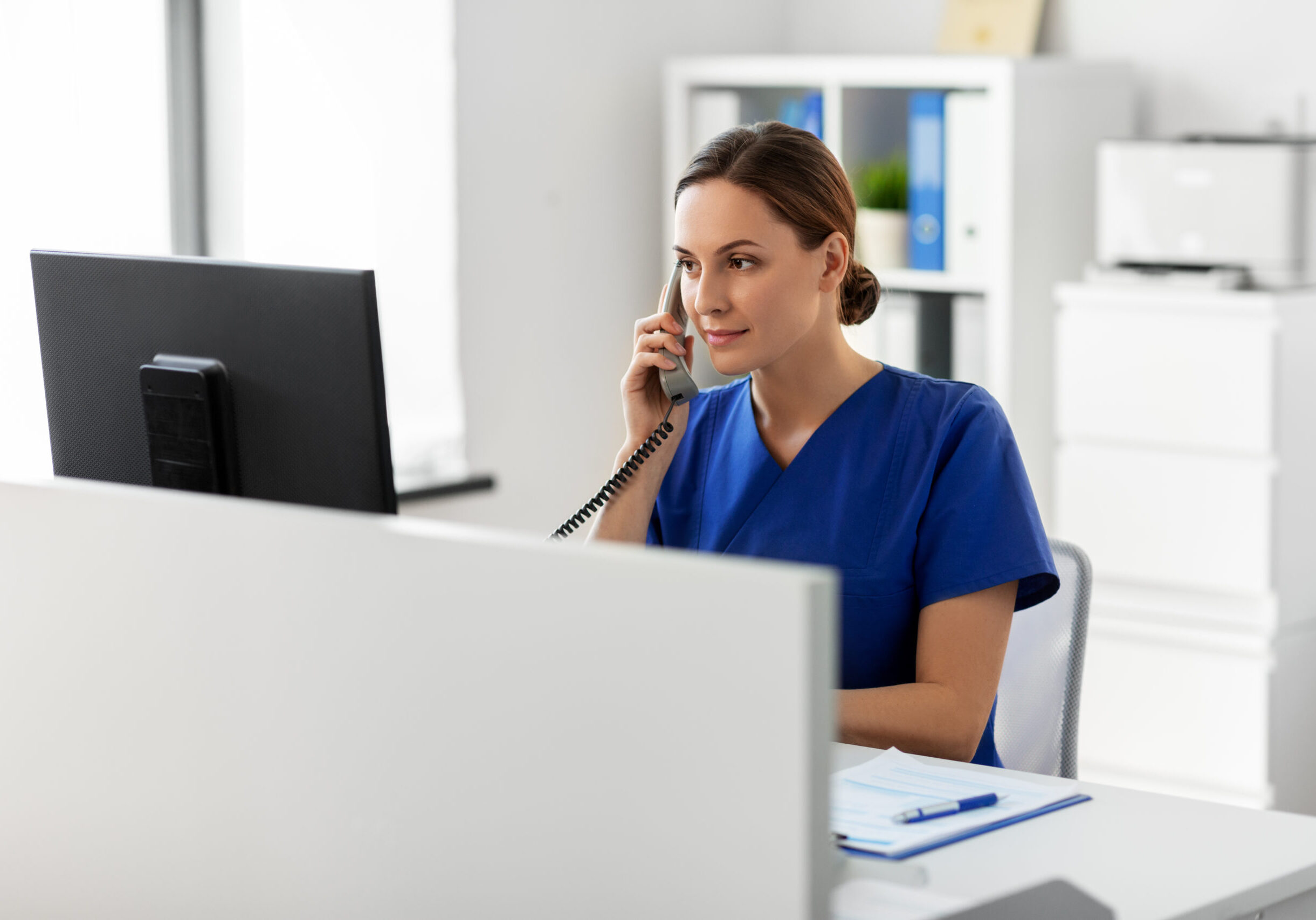 Nurse on computer